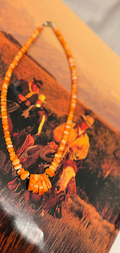 Orange spiny shell necklace.