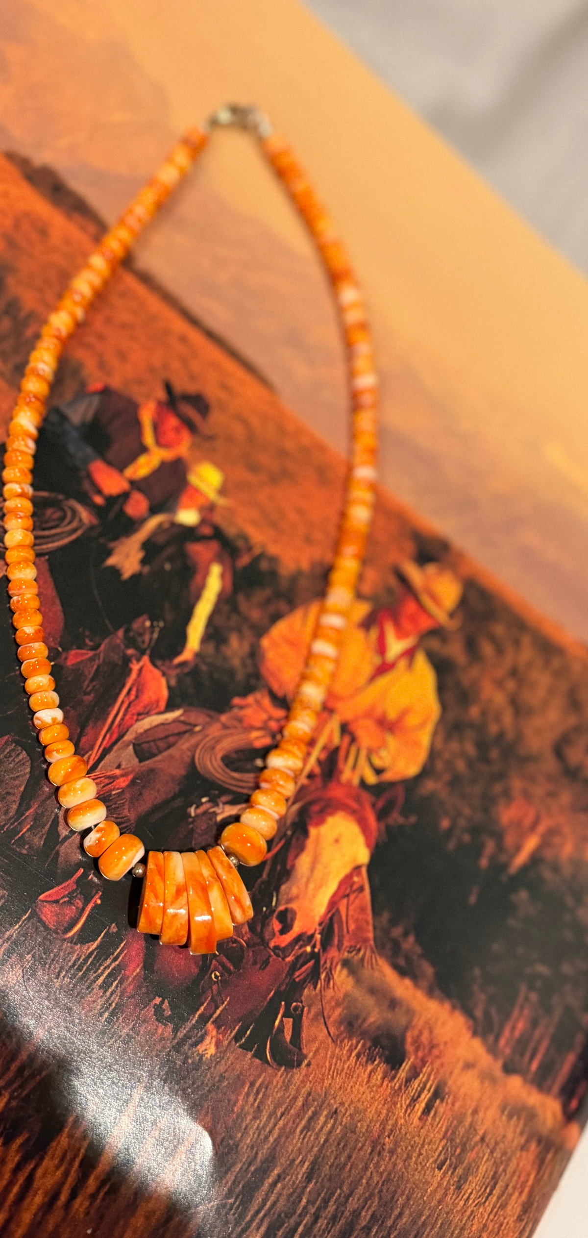 Orange spiny shell necklace.